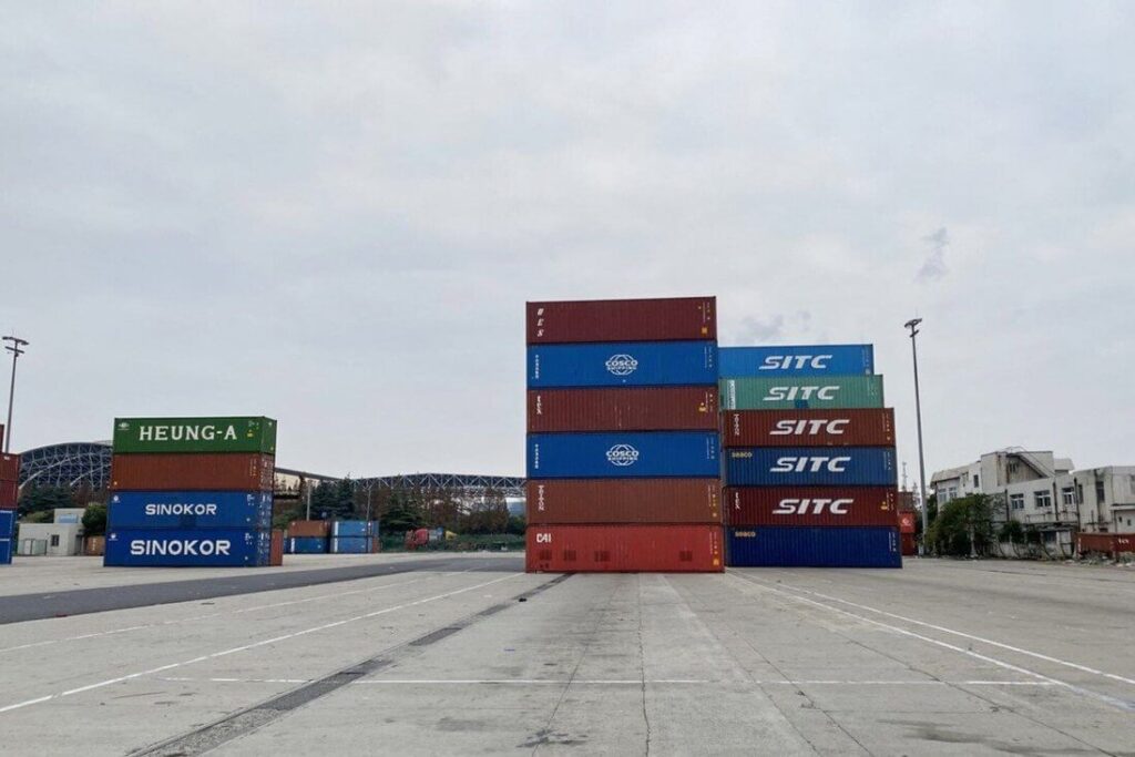 Empty freight containers stacked up at Shanghai’s Waigaoqiao port - Container Shortage 2021