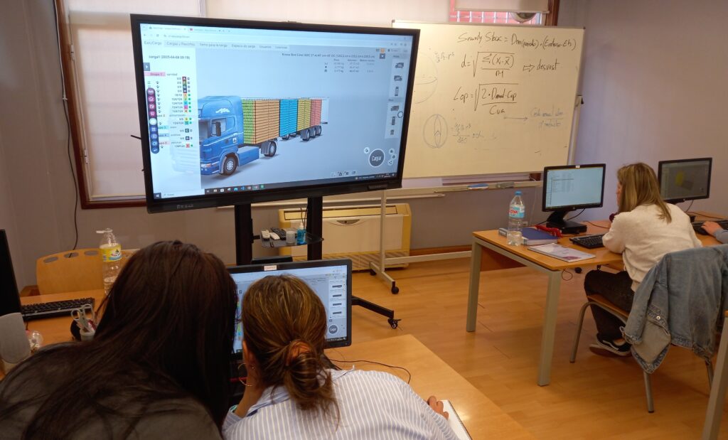 Three students from KAEME in Spain are using EasyCargo with a classroom projector for practical load planning