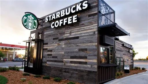 Starbucks coffee house made from containers; truck and container loading software