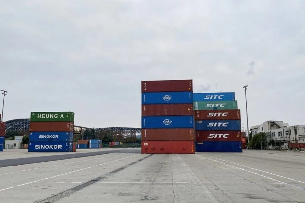 Empty freight containers stacked up at Shanghai’s Waigaoqiao port - Container Shortage 2021