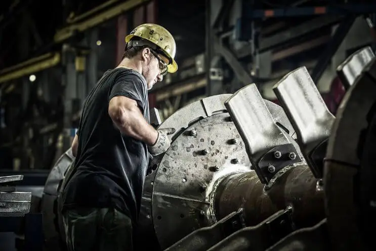 HighDefinition Image of Worker Manufacturing Mineral Mining Equipment 
